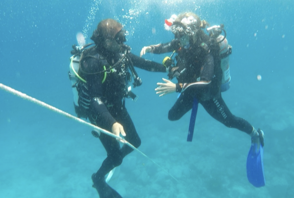 Man and woman scuba diving