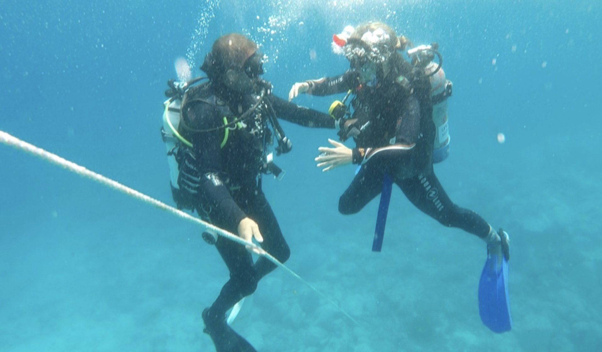 Man and woman scuba diving