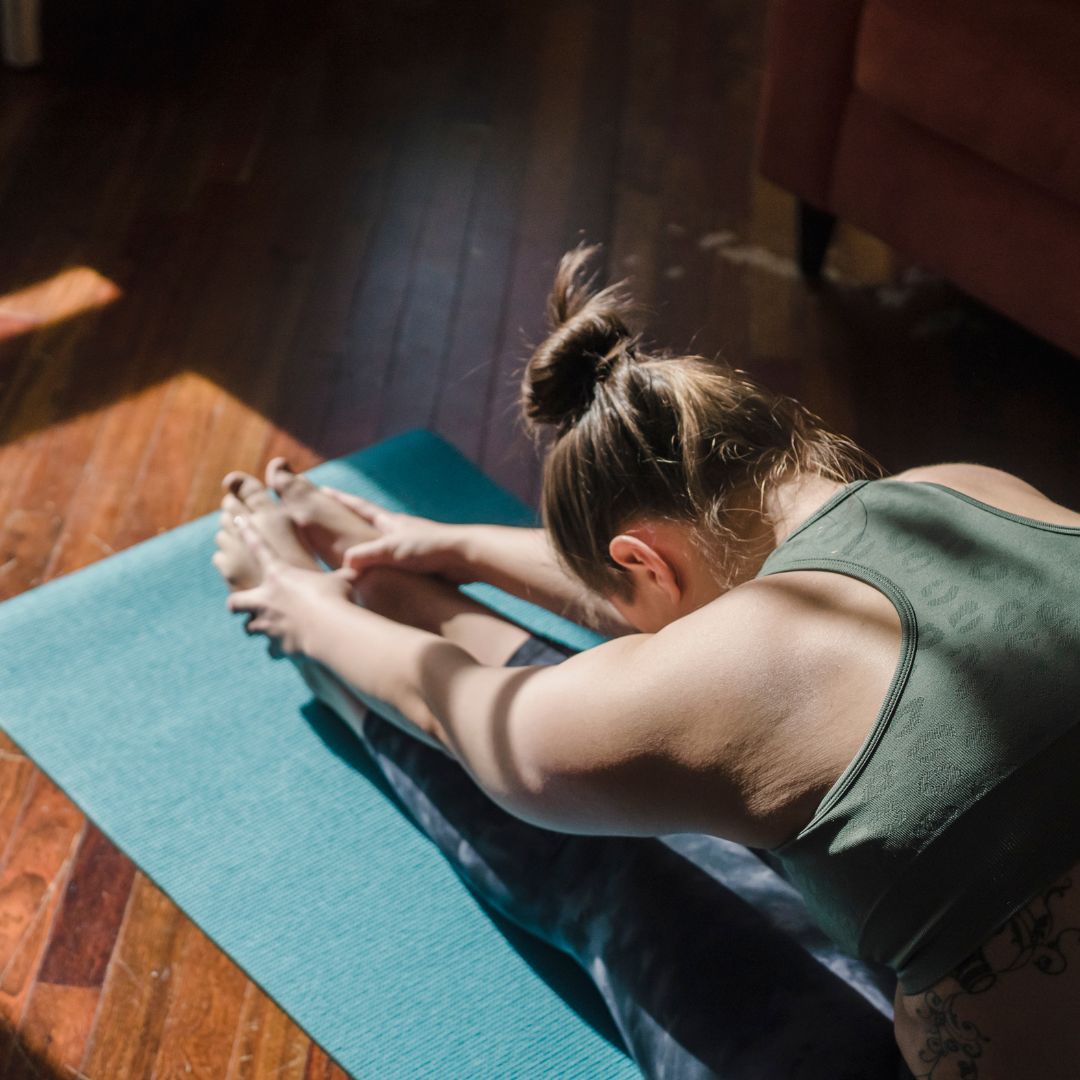 Woman stretching in a yoga pose